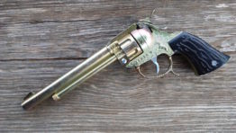 Gold Texas toy cap gun long barrel