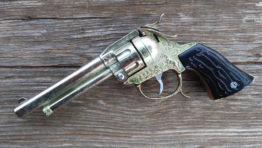 gold Texas toy cap gun short barrel