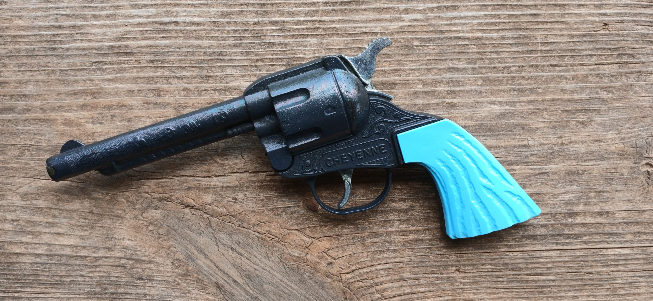 Black Granite plated Cheyenne turquoise grips western toy cap gun by wild west toys made in U S A