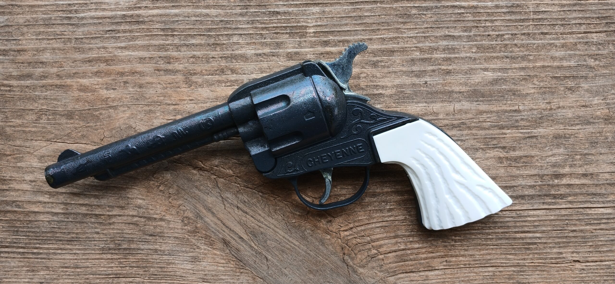 Black Granite plated Cheyenne white grips western toy cap gun by wild west toys made in U S A